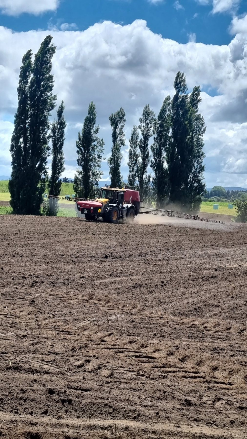 Sprayer working a cultivated paddock